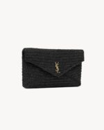 CASSANDRE LARGE ENVELOPE POUCH IN RAFFIA
