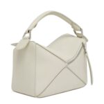 SMALL PUZZLE LEATHER TOP HANDLE BAG