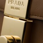 PRADA SOFT SOUND SMALL LEATHER SHOULDER BAG WITH CHARMS