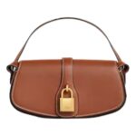 CLUTCH ON STRAP TABOU IN SMOOTH CALFSKIN