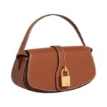 CLUTCH ON STRAP TABOU IN SMOOTH CALFSKIN