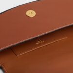 CLUTCH ON STRAP TABOU IN SMOOTH CALFSKIN