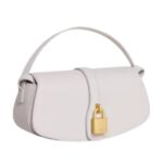 CLUTCH ON STRAP TABOU IN SMOOTH CALFSKIN