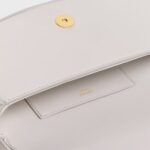CLUTCH ON STRAP TABOU IN SMOOTH CALFSKIN