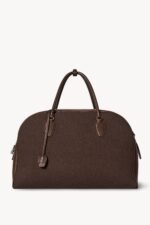 The Row India Travel Bag In Brown