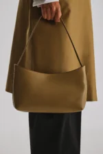 The Row Alma Mustard Leather Baguette Bag